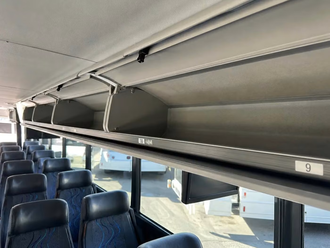 greenwood 56 passenger charter bus overhead storage